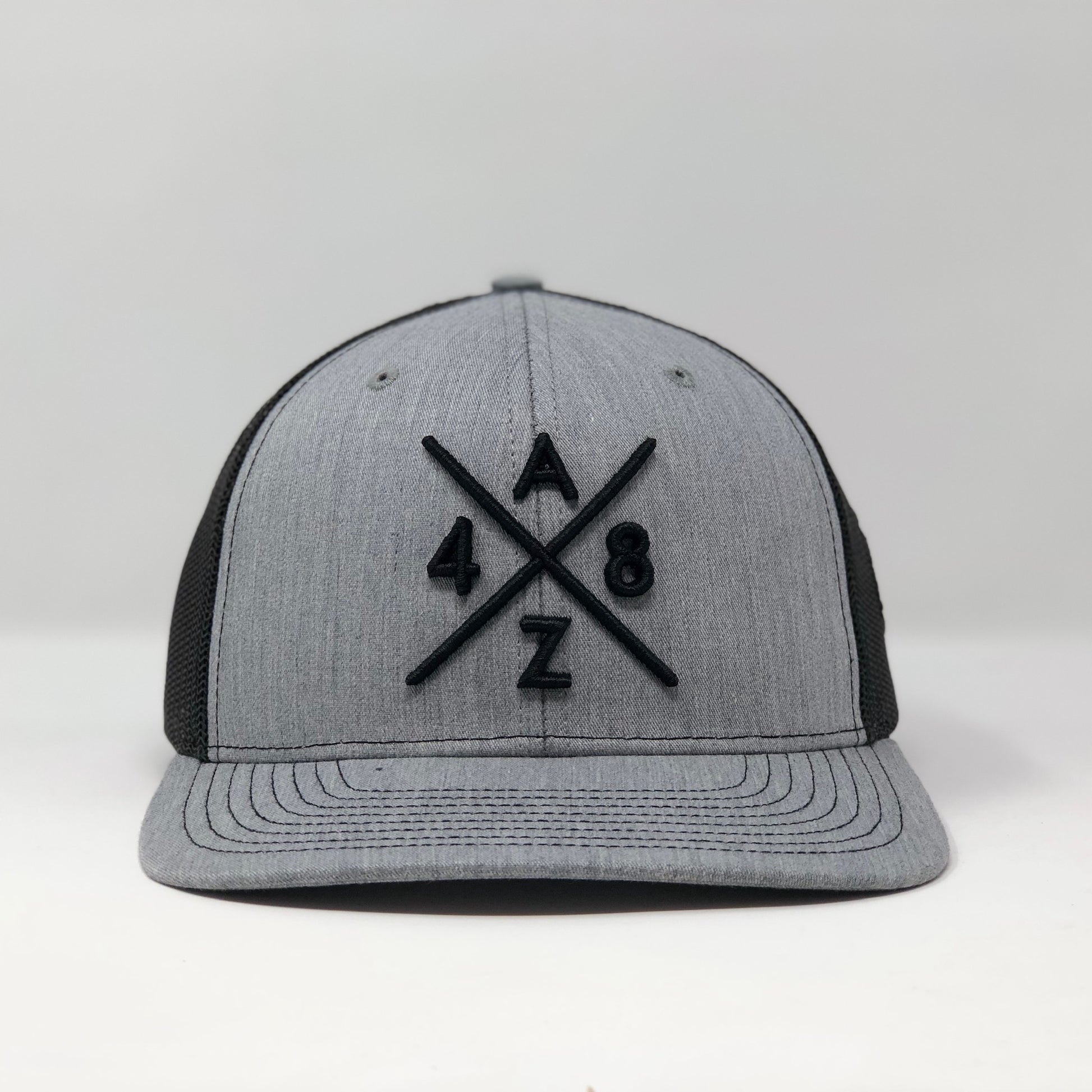 AZ48 Compass Black/Heather Grey Trucker Hat